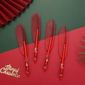 Set di 4 penne rosse a forma di foglia con motivi natalizi di renne e pupazzi di neve - Penna Piuma Rossa / Rosso