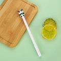 Cute panda gel pen with green bamboo accent and white barrel on a fresh green background - White