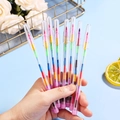 Colorful stacking block crayons for children in transparent pens, handheld over blue background - Standard Multicolor (A)