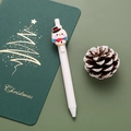 Weißer Weihnachtsstift mit Schneemann-Cartoon-Clip auf grünem Hintergrund - Schneemann / Weiß