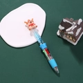 Stylo à bille multicolore de Noël avec renne festif et sables mouvants à paillettes bleues - Noël Capybara-Renne