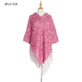 Pink and white knit poncho with chunky cable twist and long fringe tassels - Fuschia