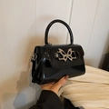 Fashionable black glossy square handbag with silver butterfly metal buckle and slim shoulder strap - Black