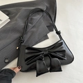 Chic black patent leather underarm bag with large bow and knotted thin shoulder strap - Black