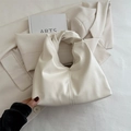 Elegante bolso de mano beige con asa retorcida y piel sintética suave para uso diario - Blanco