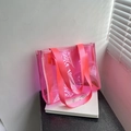 Pink translucent PVC tote bag with matching wide nylon shoulder strap and modern design - Pink
