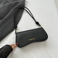 Minimalist black faux crocodile underarm bag with gold logo and knotted strap - Black
