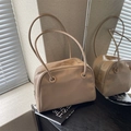 Minimalist beige leather shoulder tote bag with round handles and zipper closure - Khaki