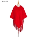 Thick red mohair knit poncho for women featuring long tassel fringes and a pullover style - Red