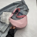 Pink nylon half-moon crossbody bag with adjustable wide strap and stylish minimalist design - Pink