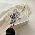 White tote bag with grey floral pattern, letter print, and decorative silk scarf - White