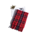 Flat lay of red and black checkered scarf with tassels next to lifestyle props - 190x65cm / Red