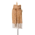 Thick knit scarf with ginger and white mixed colors and long tassels on a white mannequin - Caramel
