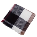 Detail of plaid scarf featuring classic herringbone weave and delicate tassel fringe edge - Black