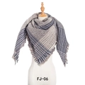Thick grey and white plaid scarf with fringe tassels on a fashion mannequin - Gray Large Plaid (FJ010-06)