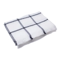 Classic black and white grid pattern scarf with fringe, folded on white background - White With Black Grid