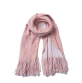 Close-up of pink knitted winter scarf featuring soft fabric texture and long tassels - Pink + White