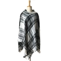 Macro shot of black and white plaid knit fabric with delicate fringe edge detail - White Light Gray Check