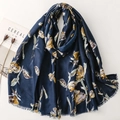 Floral print cotton linen scarf in navy blue with yellow flowers and fringe edges - Blue