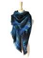 Colorful plaid scarf in blue, green, and pink with tassels on a mannequin display - 140x140cm / Blue Black