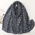 Detail of dark blue scarf with gold foil heart prints and soft satin texture fabric - Dark Blue