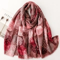 Detail of cotton linen scarf with abstract geometric dot prints and frayed edges - Red