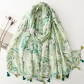 Floral print green scarf with tropical leaf pattern and tassel edge displayed on white - 180*88cm / Green