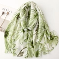 Detail of floral daisy print lightweight satin scarf with soft fringe edges and tassels - Green (SL2509-009)