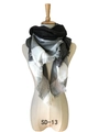 Classic black, white, and grey plaid shawl with tassels on a mannequin display - Dark Gray