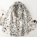 Elegant beige leopard print scarf for women featuring floral details and frayed edges - Dark Grey