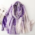 Detail of thin purple iris floral silk scarf with golden satin finish and fringed edges - Purple