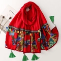 Ethnic style red shawl with floral embroidery and colorful tassels in a flat lay view - 180*88cm / Red (SL2510-001)