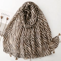 Vintage caramel zebra print scarf with tassel trim on an elegant white background - Zebra Print (SL2512-007)