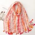 Linen-feel cotton scarf with geometric pink and orange patterns and stylish tassels - Orange Red