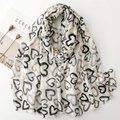 Linen feel cotton scarf with gold foil heart print and fringe in minimalist beige color - Black