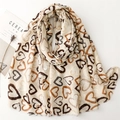 Neutral heart print scarf in soft cotton-linen style with raw fringe edges and warm tones - Beige