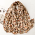 Elegant warm tone scarf with wheat leaf print and fringed edges on a clean background - 180*88cm / Khaki