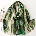Green and white abstract gradient scarf with gold foil accents and fringe edges - Green