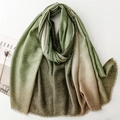 Close-up of forest green to beige gradient linen scarf with gold foil dots and tassels - 180*88cm / Green & Khaki