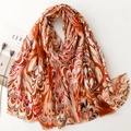 Artistic warm-toned scarf with abstract flame patterns and fringe edges on white background - Abstract Flame Orange