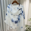 Detail view of the traditional dark blue knot buttons on a blue tie-dye linen shawl - 260*60 / Blue White Tie-dye Marble (SL2408-pk28)