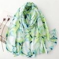 Artistic cotton linen feel scarf with gold foil floral pattern and fringe edges - Green