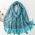 Macro shot of blue floral print cotton scarf with decorative fringe and tassels - Blue (SL2405-019)