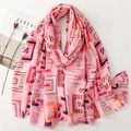 Pink geometric linen scarf with fringe edges and abstract patterns on a white background - 180x88cm / Pink