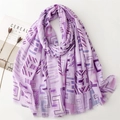 Flat lay of light purple cotton linen scarf with geometric patterns and fringe detail - 180x88cm / Purple