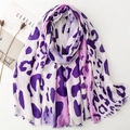 Detail of purple leopard print scarf with fine eyelash fringe on white surface - Purple Leopard (SL2407-003)