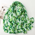 Green linen-feel scarf with gold foil donut prints and frayed edges on white background - 180*88cm / Green