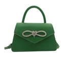 Groene handtas van imitatieleer met grote strass-strik en een bovenhandvat - Groen