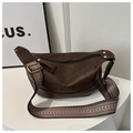 Detail of retro dark brown bag with woven geometric strap and gold-tone hardware accents - Coffee
