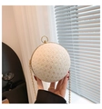 Detail of spherical evening bag with white lace, colorful sequins and gold chain strap - White